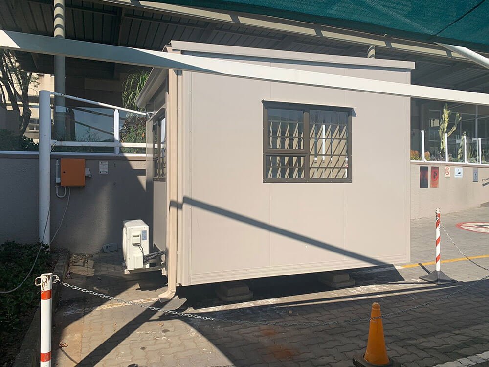 Prefabricated guard hut in an office entrance